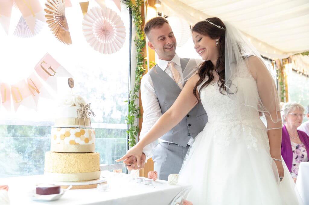 tiered cake cutting reception bride groom cherwell boathouse riverside venue oxford oxfordshire wedding photography 06