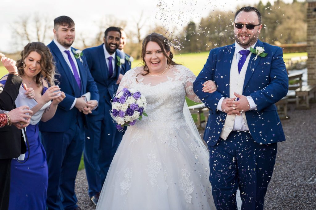 groomsmens confetti shower royal chapel windsor great park marriage ceremony berkshire oxfordshire wedding photography