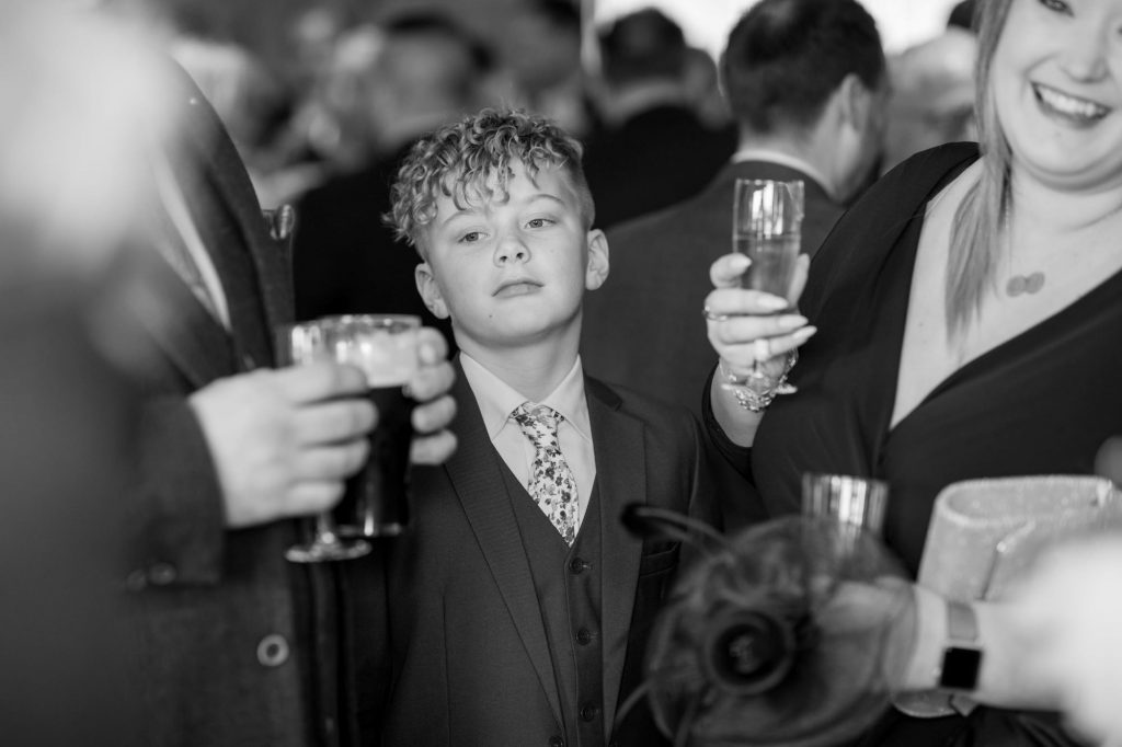 thoughtful young guest reception york club windsor great park berkshire oxfordshire wedding photographer