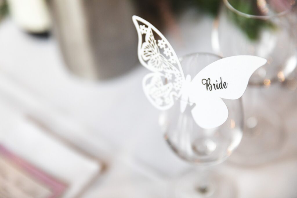 brides butterfly table decoration cain manor reception surrey oxford wedding photographers