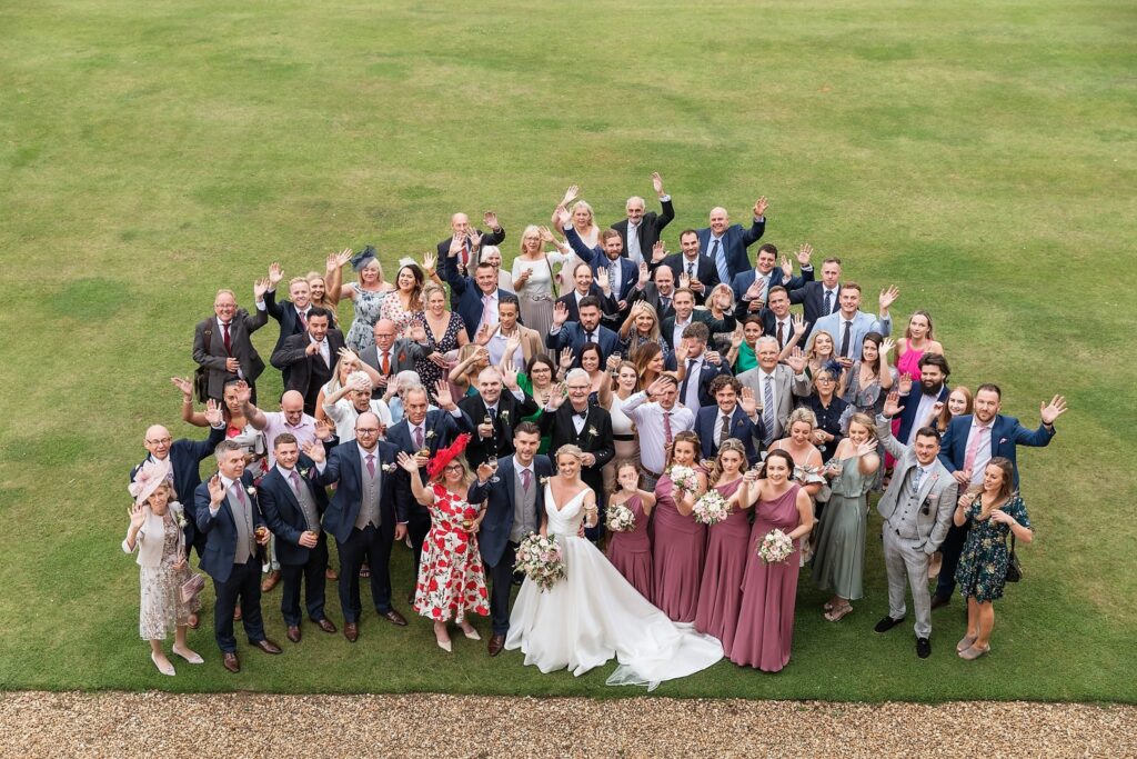 waving bridal party champagne reception holdenby northamptonshire oxfordshire wedding photographers