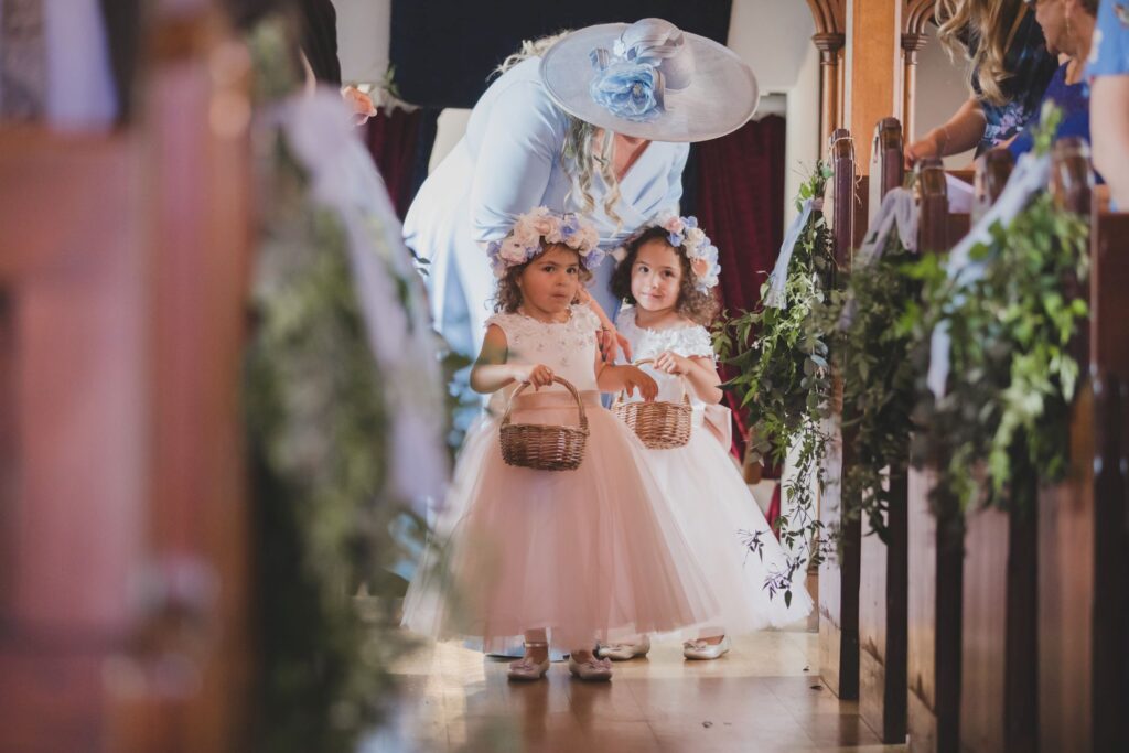 64 flowergirls carry rose petal baskets thorganby venue ceremony north yorkshire oxford wedding photographers