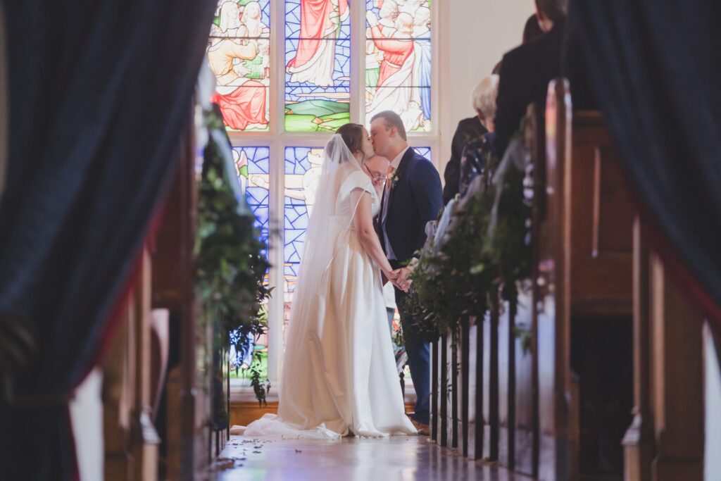 79 bride grooms first kiss thorganby marriage ceremony north yorkshire oxfordshire wedding photographers